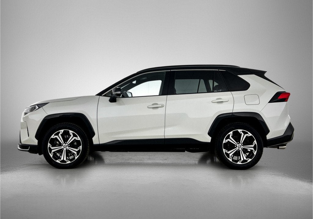 Toyota RAV4 2.5 Plug-in Hybrid AWD Bi-Tone Plus | Premium ui, Auto's, Toyota, Automaat, 12 maanden, Gebruikt, 4 cilinders