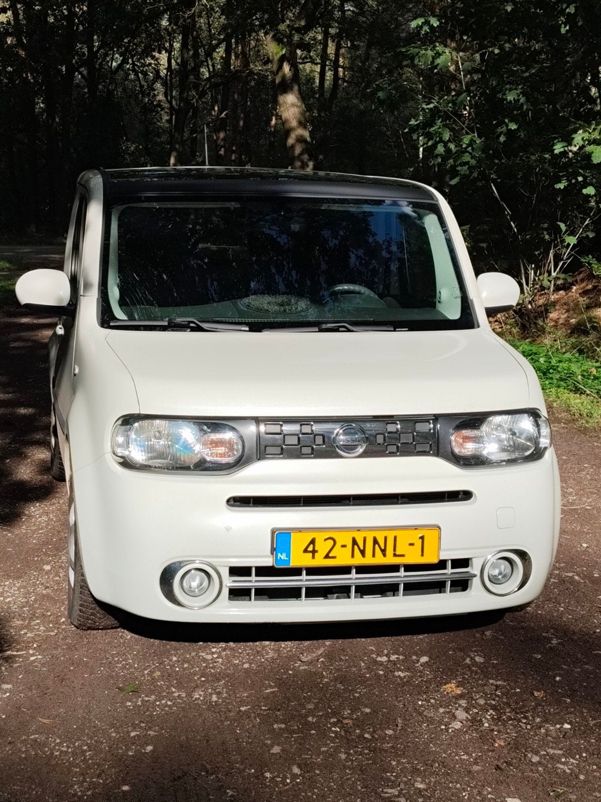 Nissan Cube 1.6 CVT 2010 Wit, Auto's, Stof, 4 cilinders, Wit, Grijs