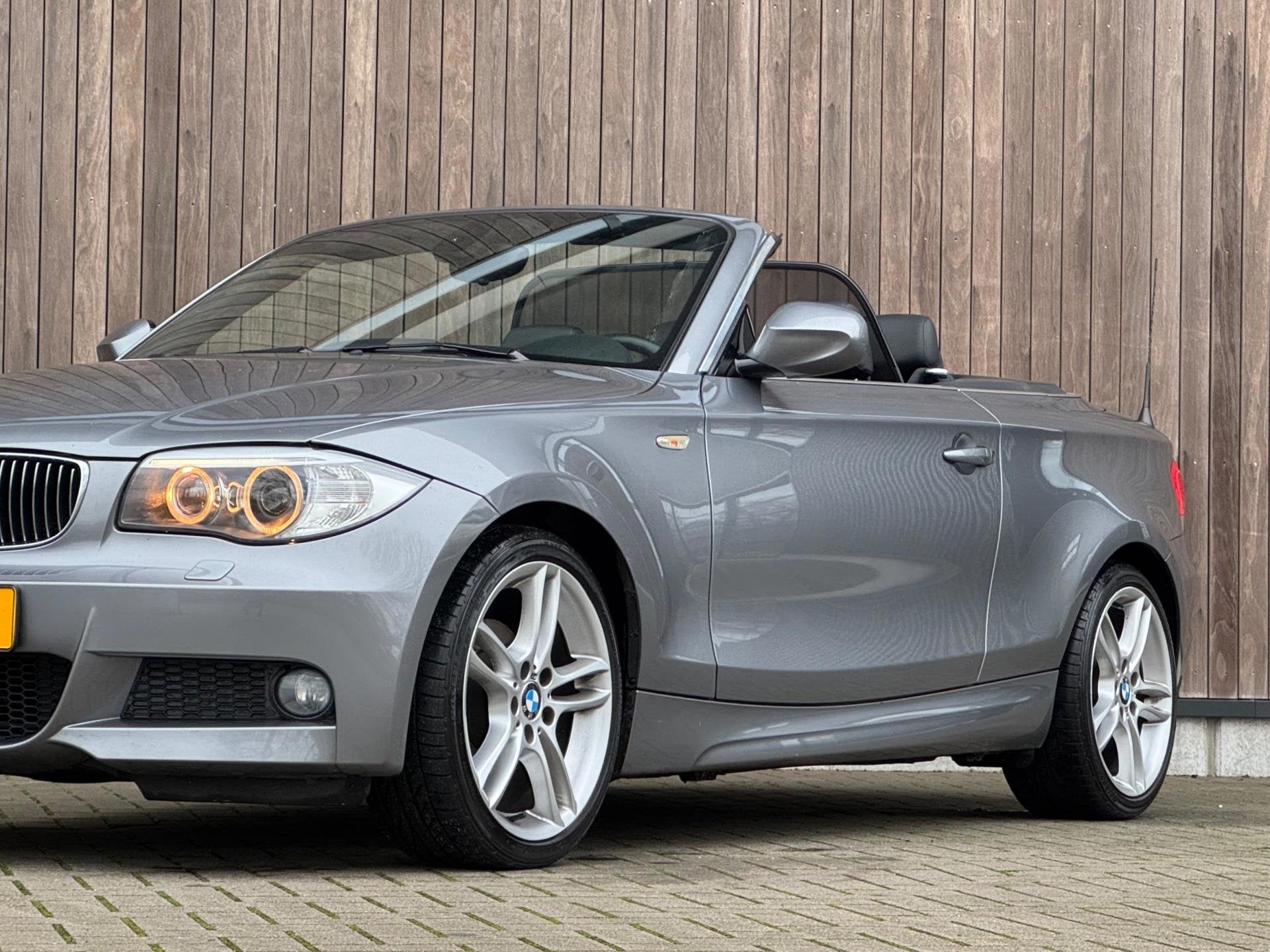 BMW 1-serie Cabrio 118i High Executive M-Sport, Auto's, BMW, Euro 5, Achterwielaandrijving, Zwart, Cabriolet