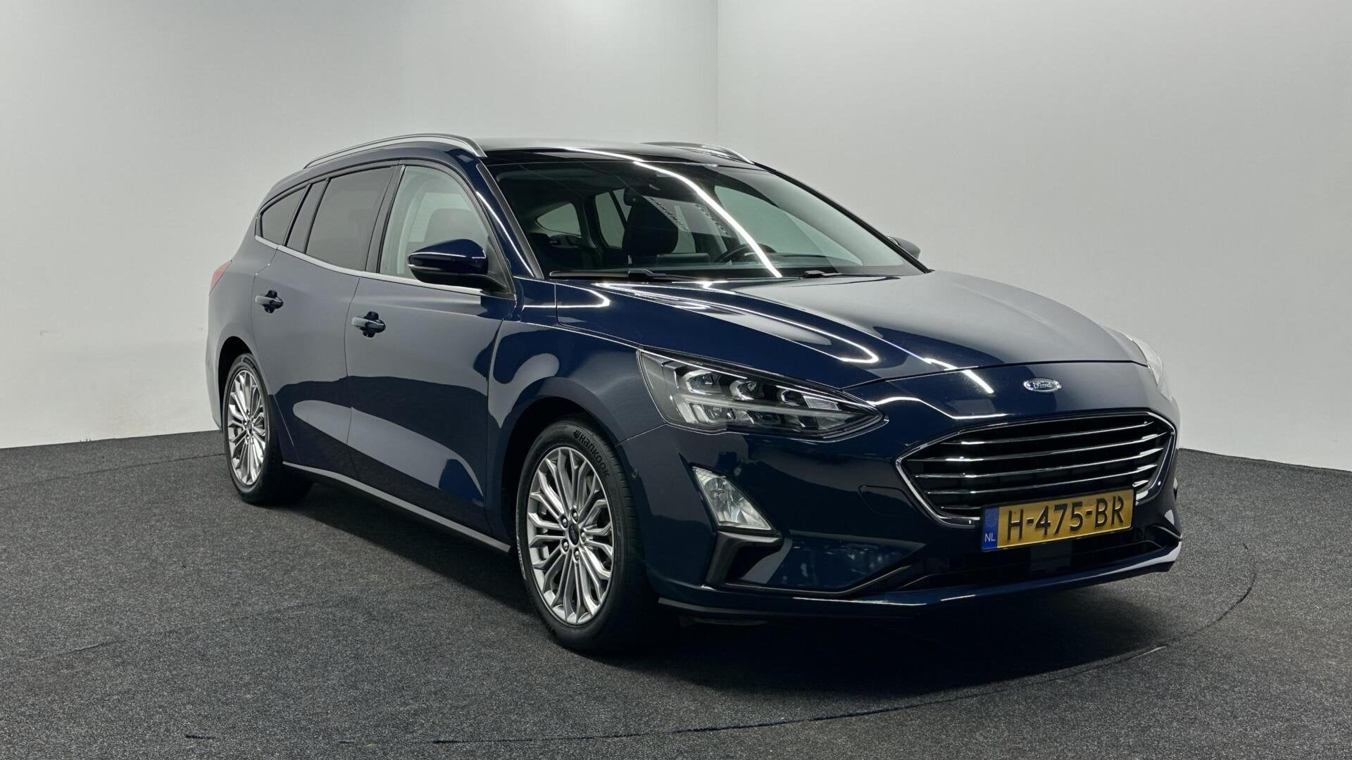 Ford Focus Wagon 1.0 EcoBoost Titanium Business HEAD UP CARP, Gebruikt, Automatische klimaatregeling, Met garantie (alle), Origineel Nederlands