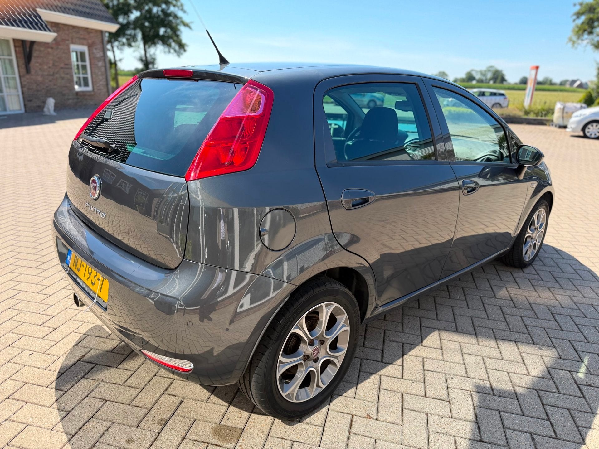 Fiat Punto Evo 0.9 TwinAir Lounge/ Airco/ Navi/ Cruise/ LM V, Auto's, Fiat, Voorwielaandrijving, Dealer onderhouden, Gebruikt