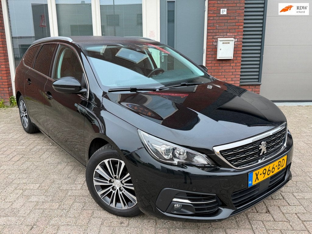Peugeot 308 SW 1.2 PureTech Blue Lease Premium / Leder / Nav, Gebruikt, 1199 cc, Zwart, 3 cilinders