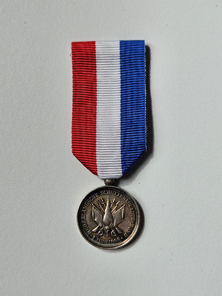 medaille Prijspenning Nederlandse Schutterij kaderbond 1886, Verzamelen, Ophalen of Verzenden, Landmacht, Nederland, Lintje, Medaille of Wings