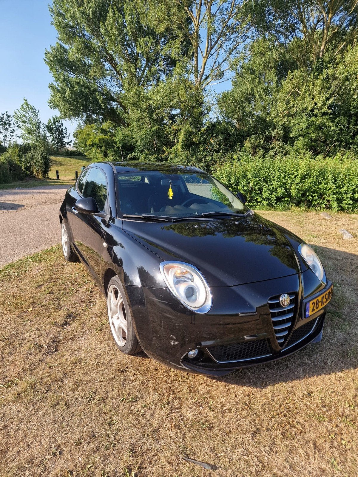 Alfa Romeo MiTo 1.4 Turbo 88KW 2010 Zwart, Auto's, Voorwielaandrijving, Zwart, 4 cilinders, Origineel Nederlands