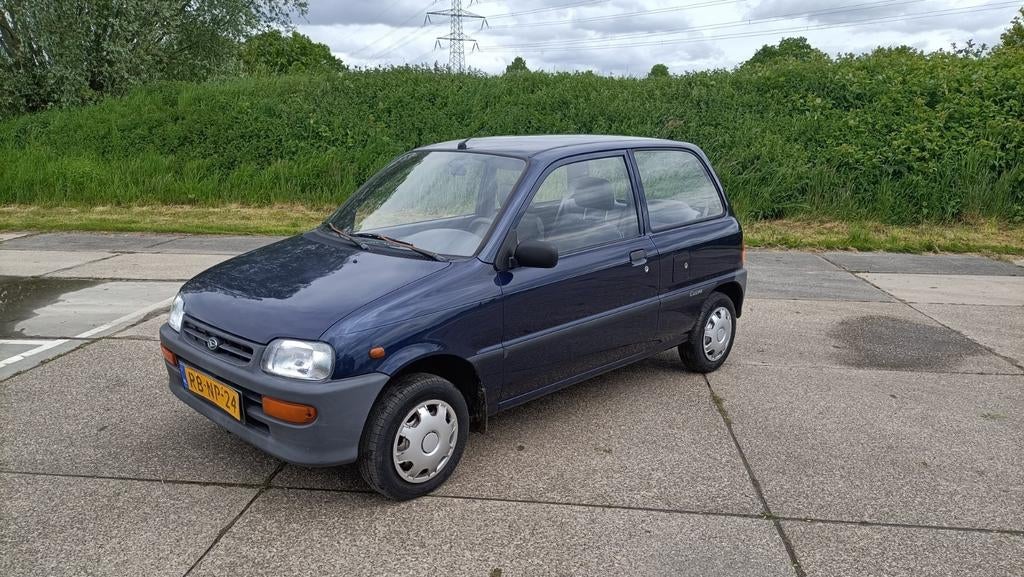 Daihatsu Cuore 0.8 AUTOMAAT nieuwe apk, Auto's, Daihatsu, 43 pk, Blauw, Cuore, 3 cilinders