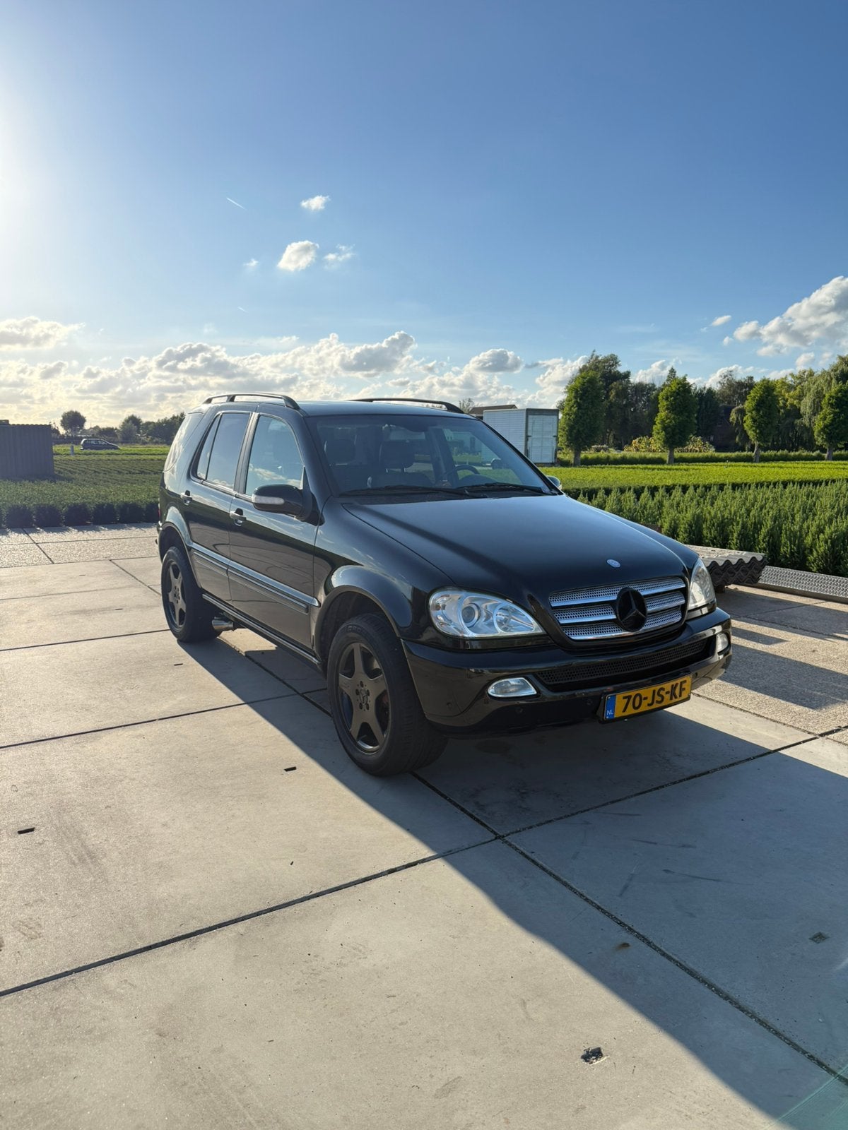 Mercedes ml 320, Auto's, Mercedes-Benz, Automaat, 7 stoelen, Zwart, Vierwielaandrijving