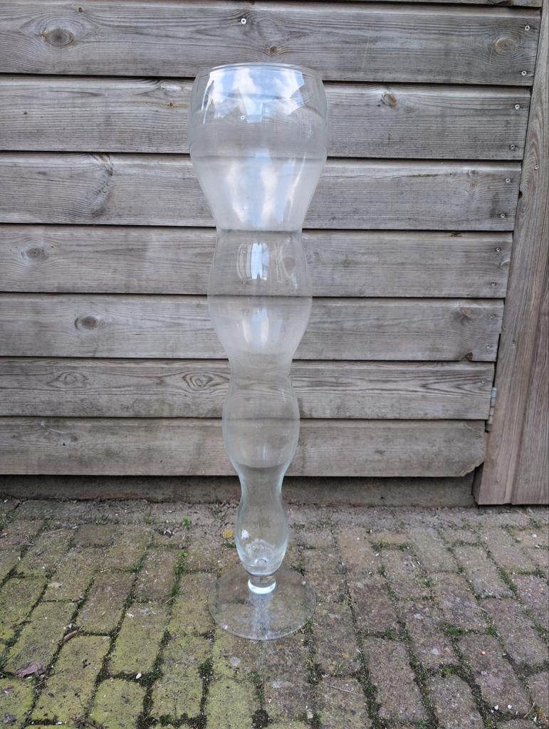 Grote glazen vaas, Ophalen