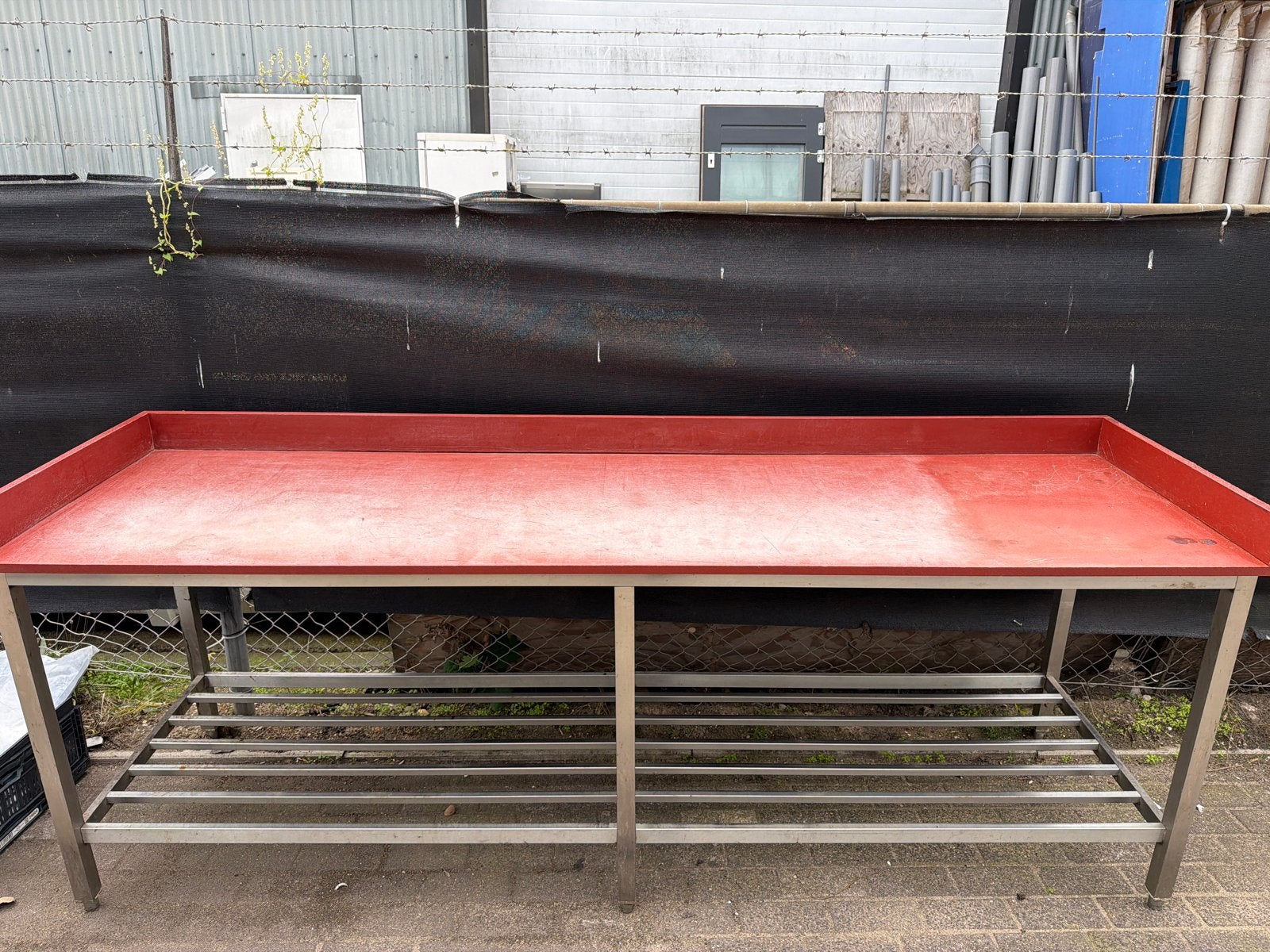 Slagers werkblad RVS Werkbank met rood kunststof blad, Ophalen, Gebruikt