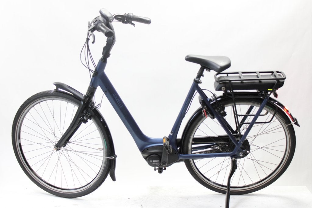 Gazelle Orange C310 57 cm elektrische fiets, Gebruikt, Gewoonfietsen, Info@gewoonfietsen.nl, 50 km per accu of meer