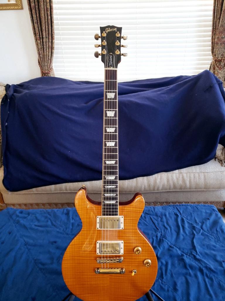 Gibson Les Paul Double Cutaway Lemon Burst, Ophalen of Verzenden, Zo goed als nieuw, Solid body, Fender
