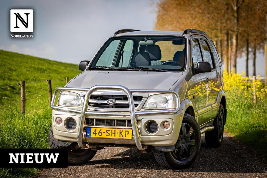Daihatsu Terios 1.3 SXE |Automaat |Nap |Airco |Trekhaak, Auto's, Daihatsu, 1350 kg, Metallic lak, 4 cilinders, Met garantie (alle)
