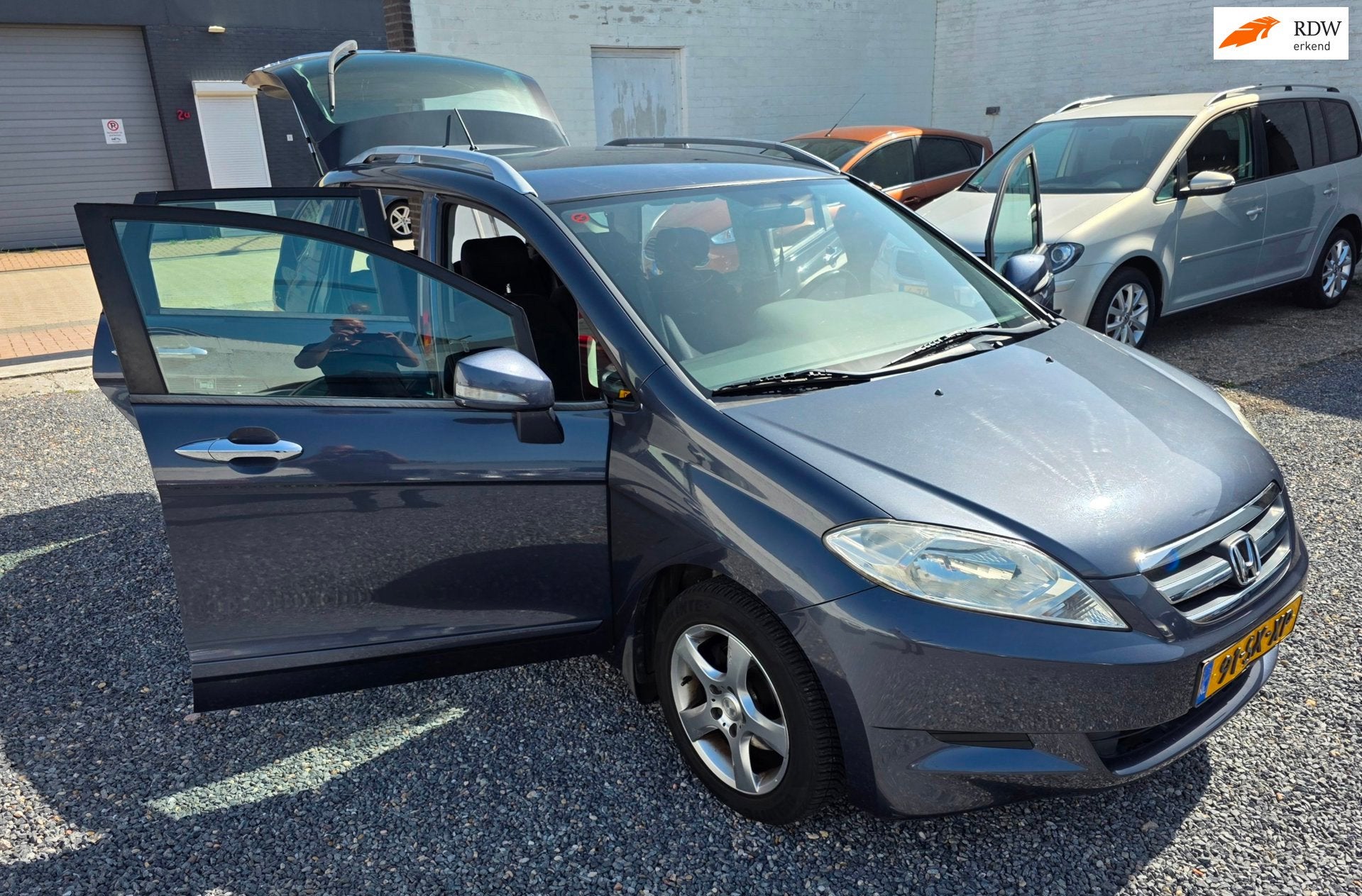 Honda FR-V 1.7i Comfort 6 personenauto, Auto's, Dealer onderhouden, 125 pk, Zwart, 4 cilinders