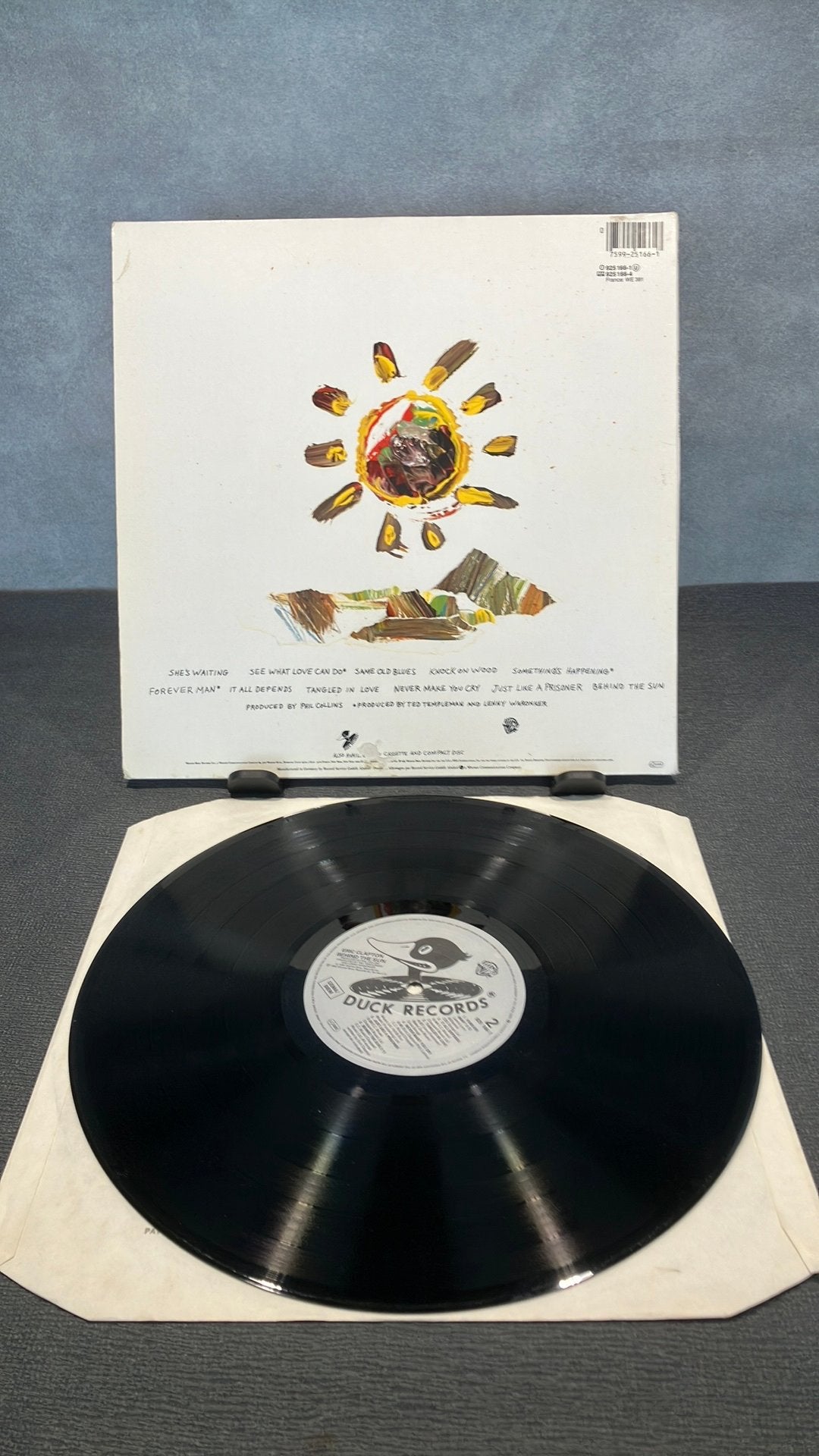 Eric Clapton —. Behind The Sun, LP, Beschermende buitenhoes, Gebruikt, Ophalen of Verzenden