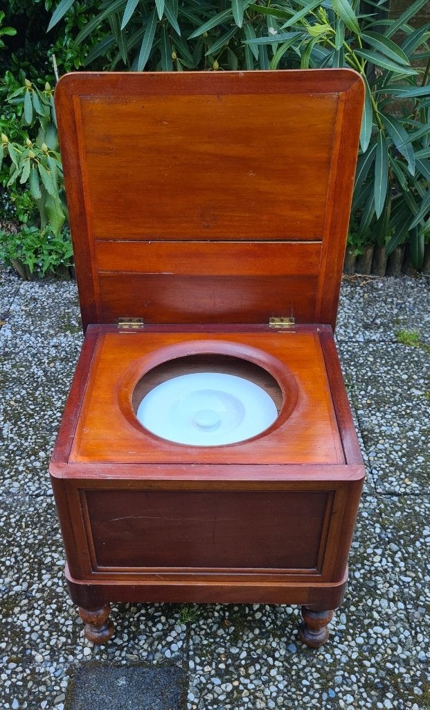 Antieke houten postoel, Ophalen