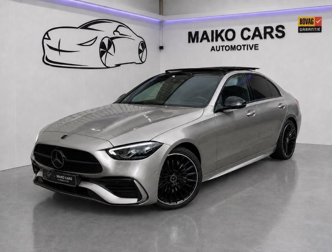 Mercedes-Benz C-klasse 300 e AMG Line Pano,Carbon,360 Cam,Bu, Automaat, Dealer onderhouden, Zwart, 4 cilinders