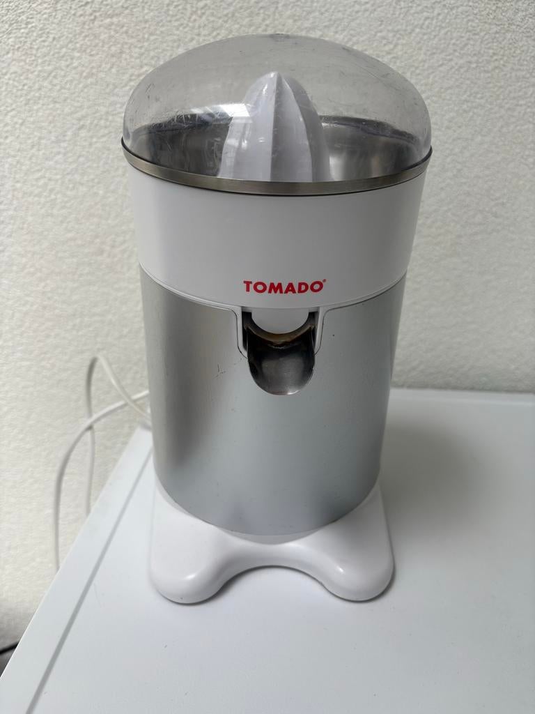 Tomado Citruspers - Elektrisch en Gebruikt, Witgoed en Apparatuur, Juicers, Ophalen of Verzenden, Zo goed als nieuw, Elektrisch