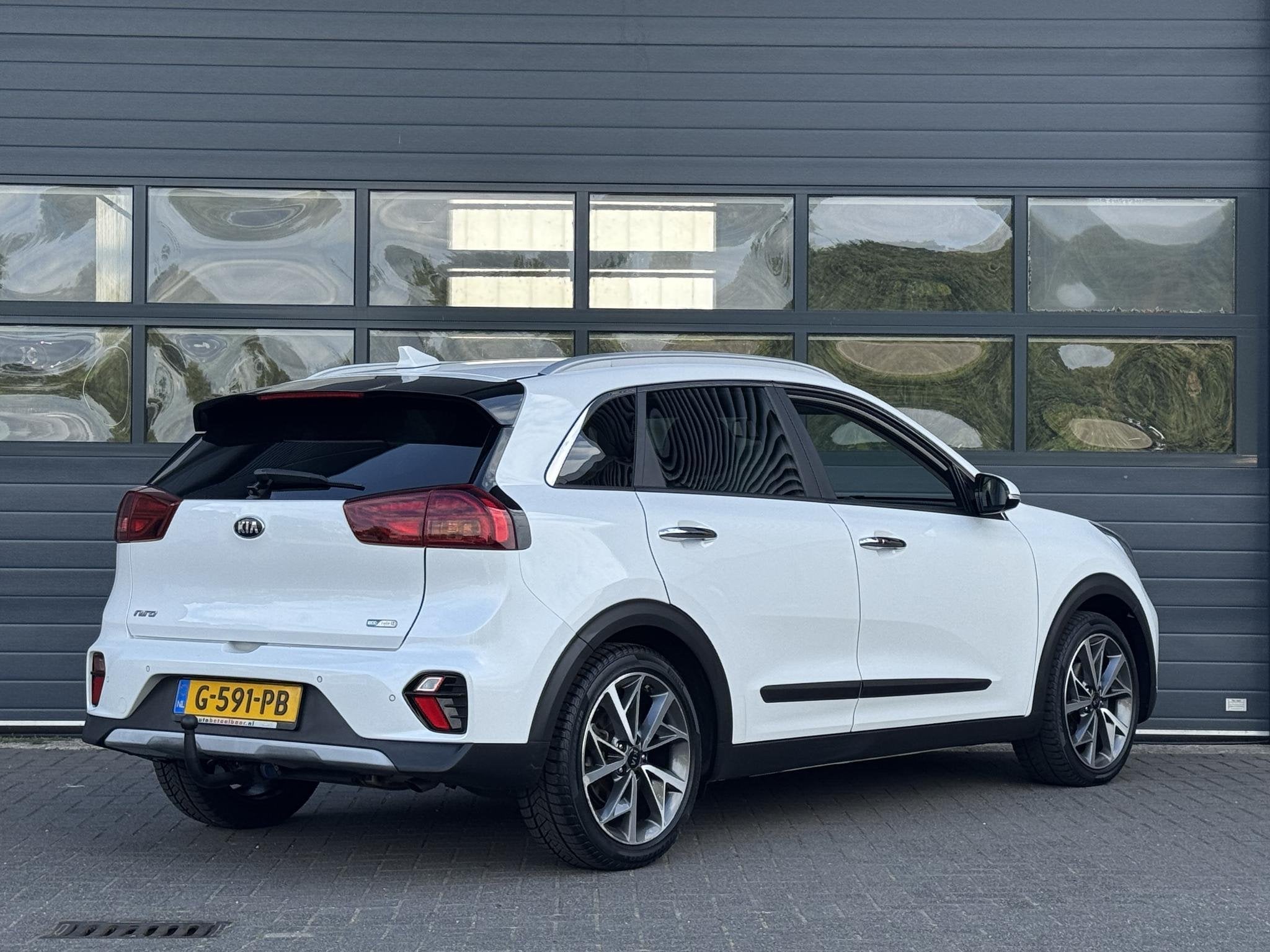 KIA NIRO 1.6 GDi HYBRID EXECUTIVELINE I AUTOMAAT I TREKHAAK, Auto's, Kia, Gebruikt, Lichtsensor, 1390 kg, SUV of Terreinwagen