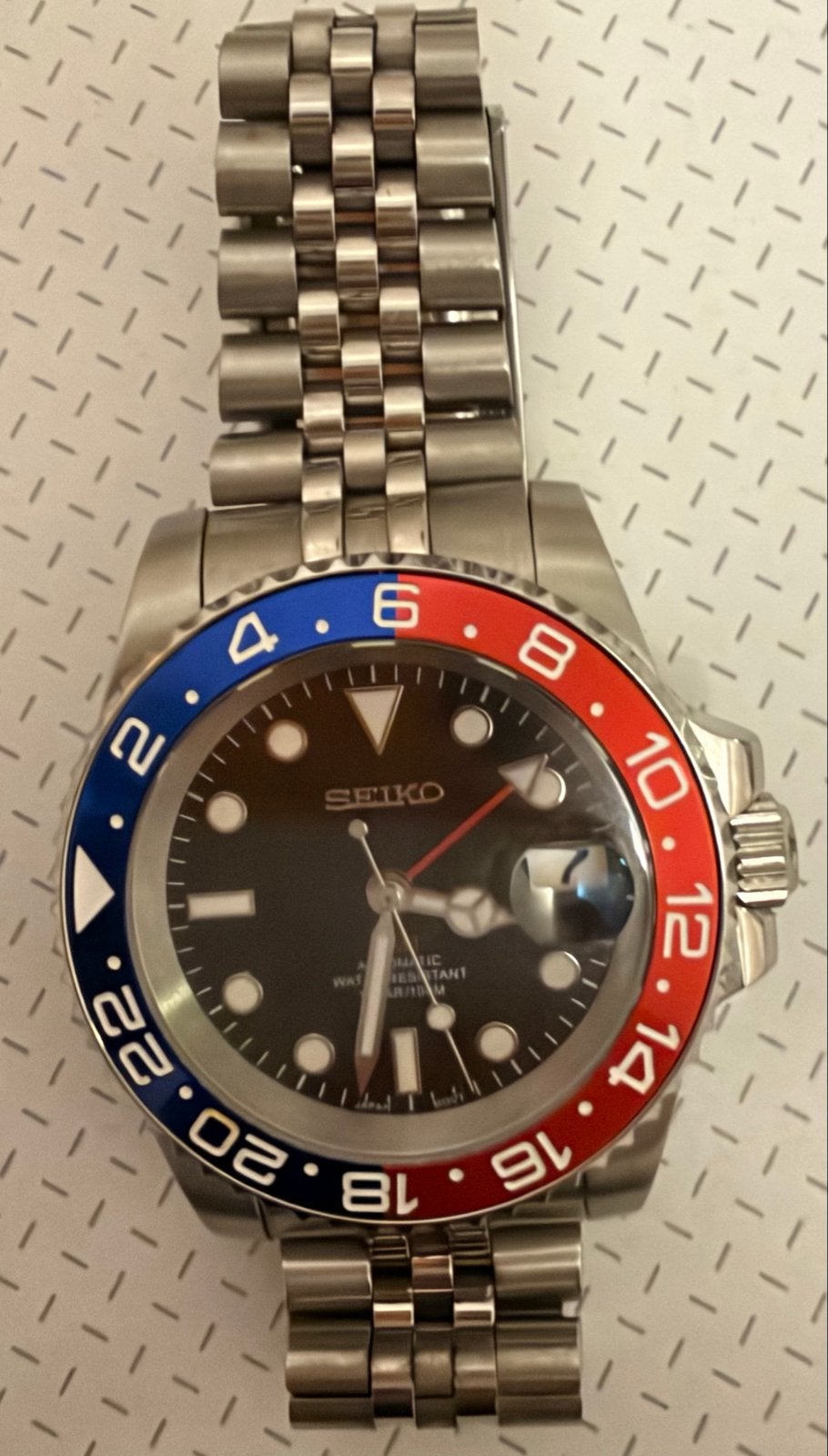 Seiko Polshorloge met GMT-bezel en stalen band, Sieraden, Tassen en Uiterlijk, Seiko, Staal, Polshorloge, Ophalen of Verzenden