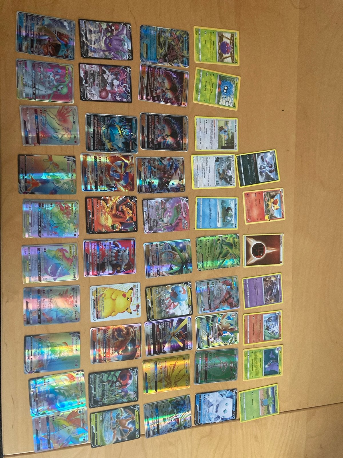 Neppe Pokémon kaarten met regenboog, zilveren Pikachu, Rayqu, Ophalen, Gebruikt, Meerdere kaarten, Foil