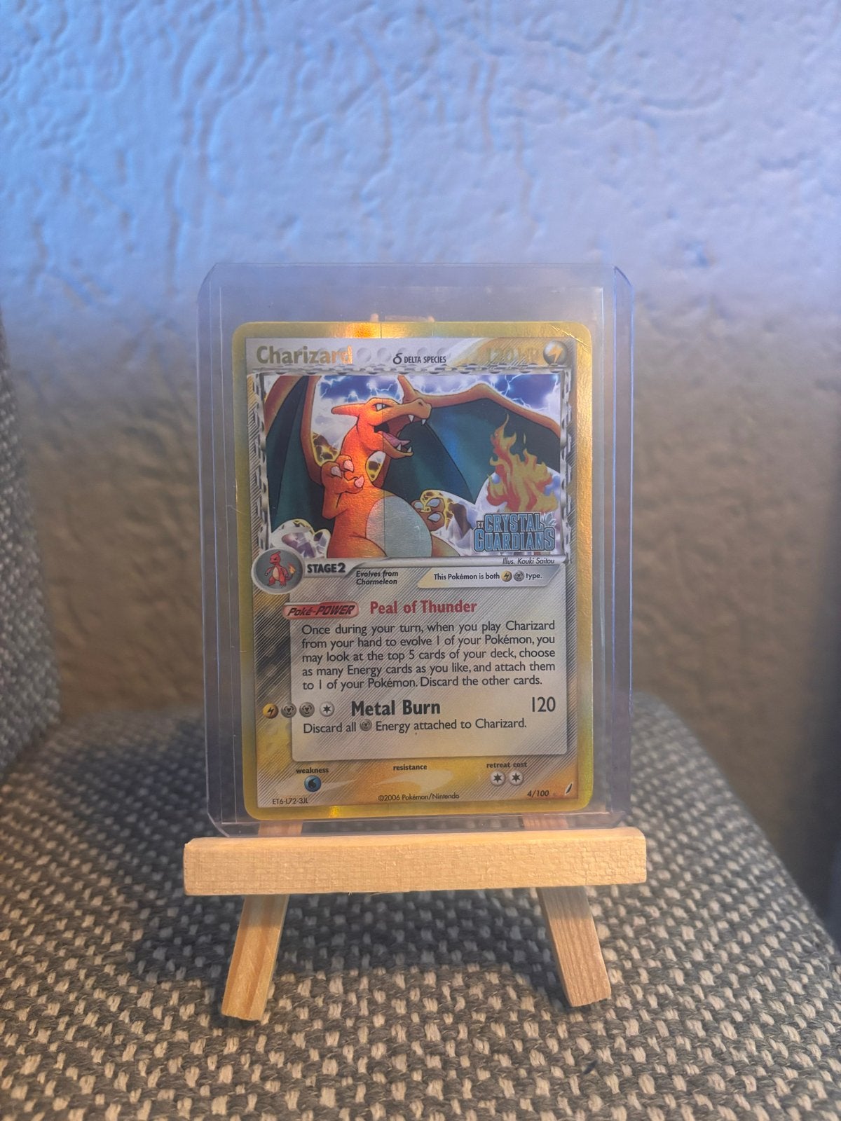 Charizard 4/100 STAMPED Delta Species, Ophalen of Verzenden, Zo goed als nieuw, Losse kaart, Foil
