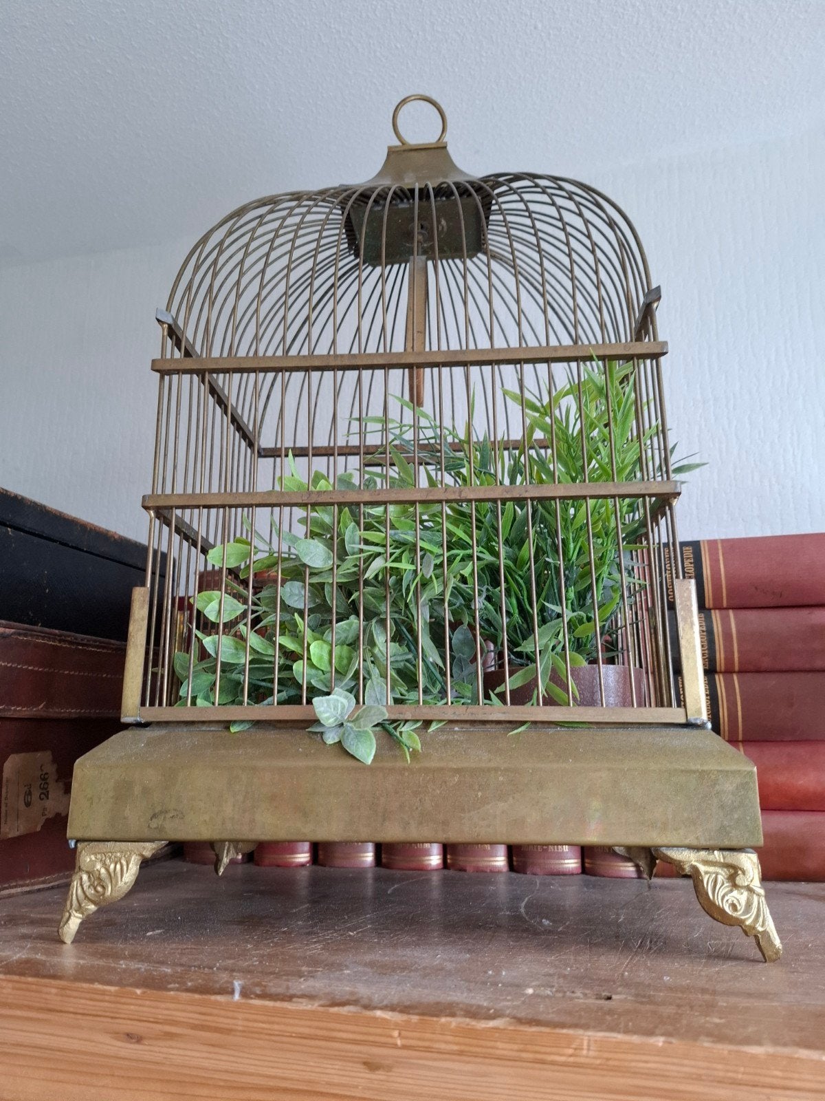Oud koperen vogelkooitje, Ophalen