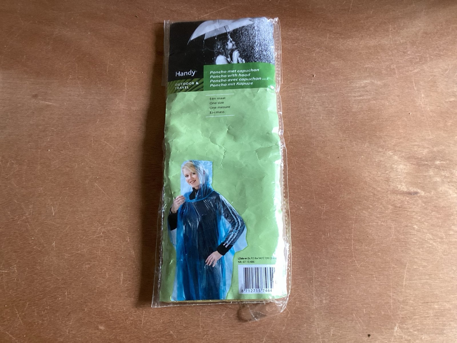 Handige wegwerp regenponcho met capuchon, Ophalen of Verzenden, Nieuw, Regenpak, Dames
