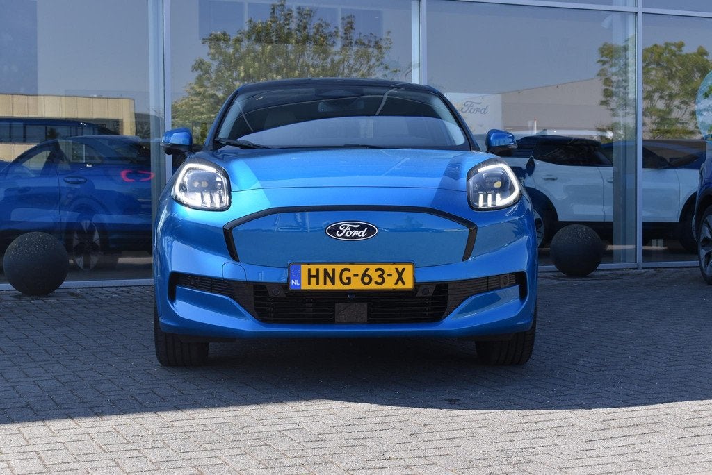 Ford Puma Gen-E Premium 44 kWh | Demo | Digital Aqua Blue |, Stof, 750 kg, 23 min, Blauw