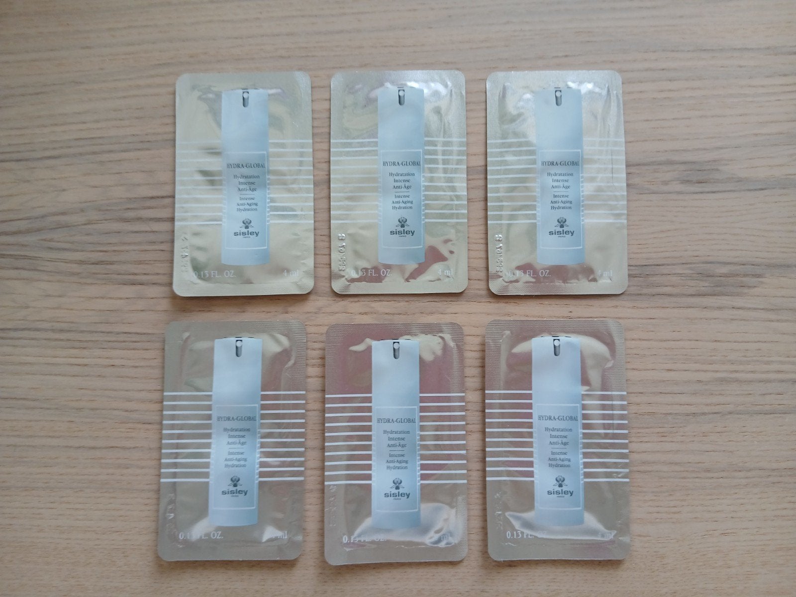 24 ML Sisley Hydra-Global Anti-Aging Hydra Booster nu €21,50, Ophalen of Verzenden, Nieuw, Gehele gezicht