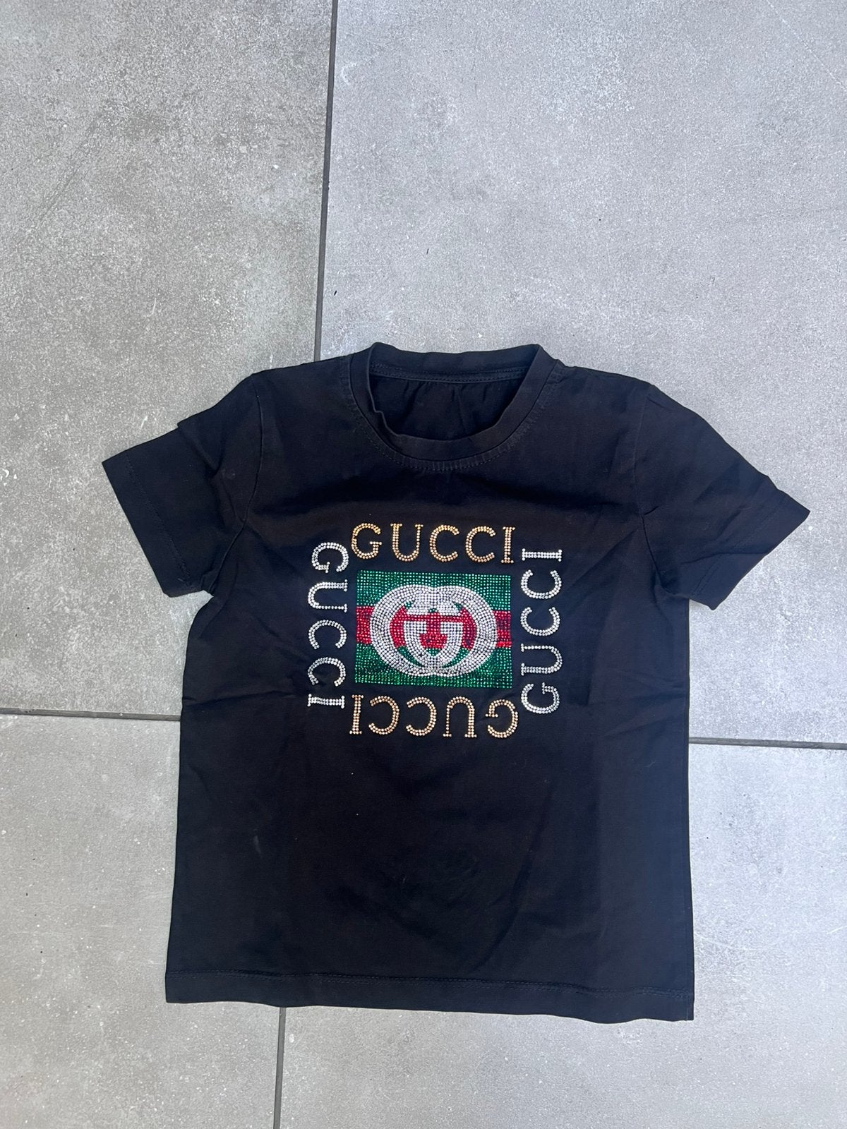 GUCCI ZWART T- SHIRT UNISEX STRASS LOGO MAAT 80, Ophalen of Verzenden, Zo goed als nieuw, Jongetje of Meisje, Shirtje of Longsleeve