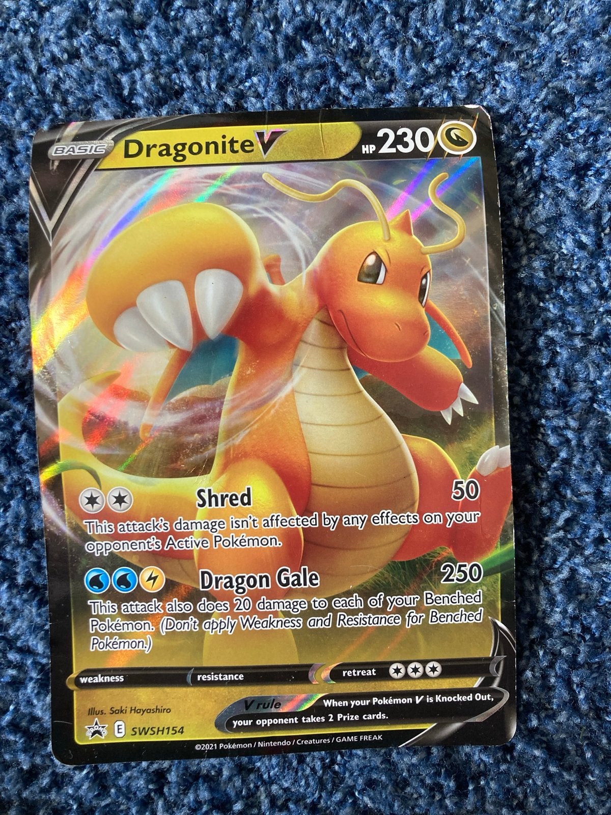 Pokémon Kaart: Grote kaart Dragonite V SWSH154 (Zeldzaam), Ophalen of Verzenden, Zo goed als nieuw, Losse kaart