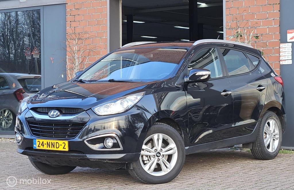 Hyundai ix35 2.0i Style Leer Airco Cruise controle Automaat, Auto's, Gebruikt, 4 cilinders, Parkeersensor, 1600 kg