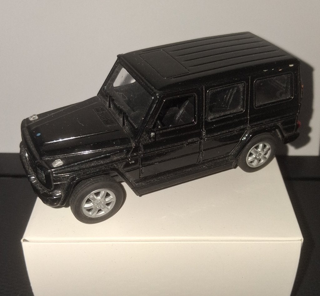 1:36 Mercedes G-Klasse, Hobby en Vrije tijd, Ophalen of Verzenden, Gebruikt, Auto, Overige merken
