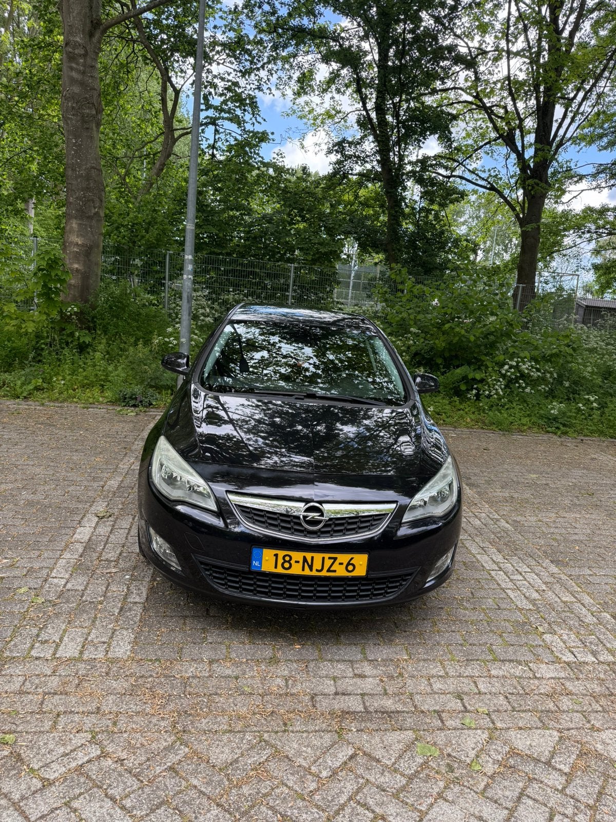 Opel Astra 1.6 85KW 5D AUT 2010 Zwart, 1250 kg, 4 cilinders, Leder en Stof, Zwart