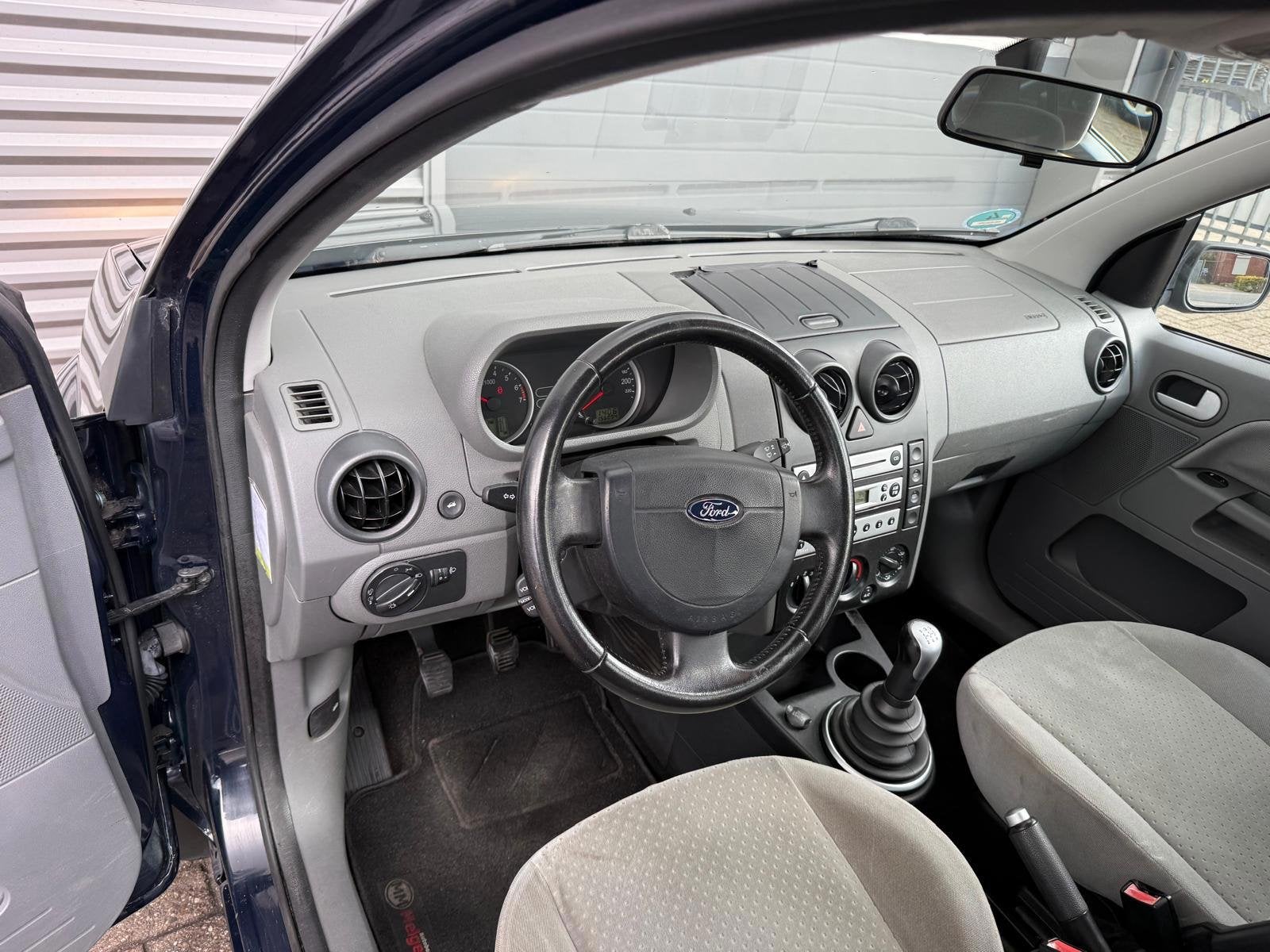 Ford Fusion 1.4-16V Ghia, Auto's, Voorwielaandrijving, Blauw, Origineel Nederlands, Bedrijf