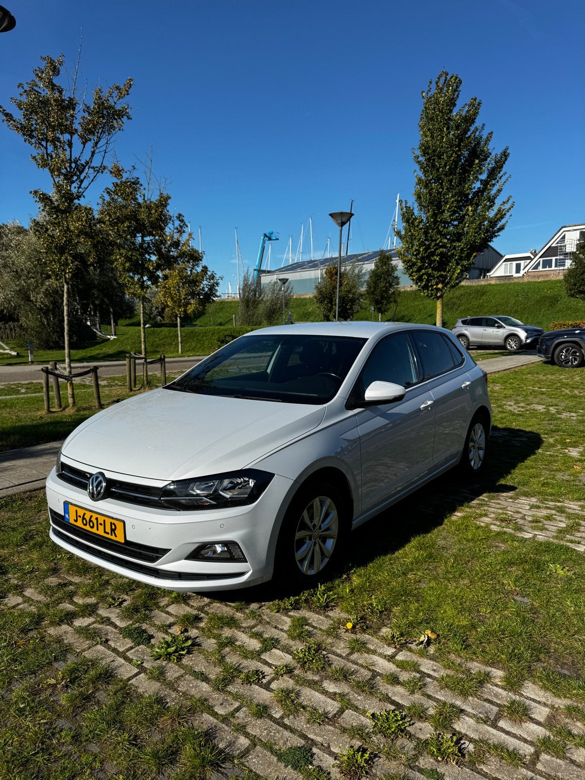 Volkswagen Polo 1.0 TSI 95pk 7-DSG 2019 Wit, Auto's, Stof, 95 pk, Particulier, Geïmporteerd