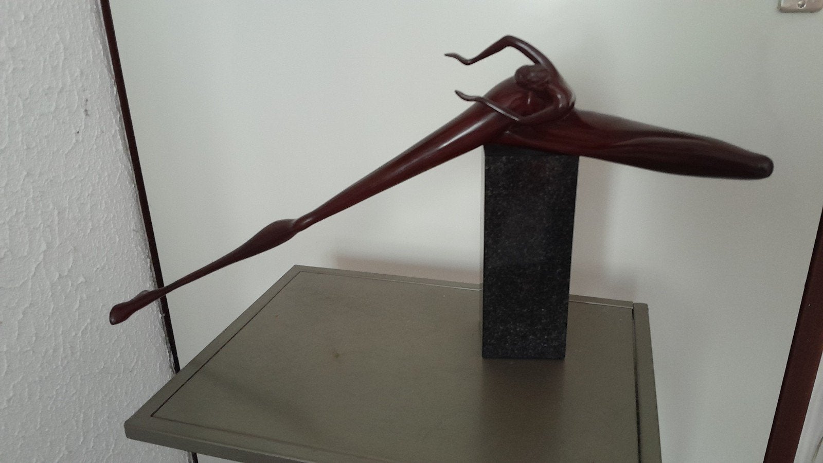Bronzen beeld, Ophalen