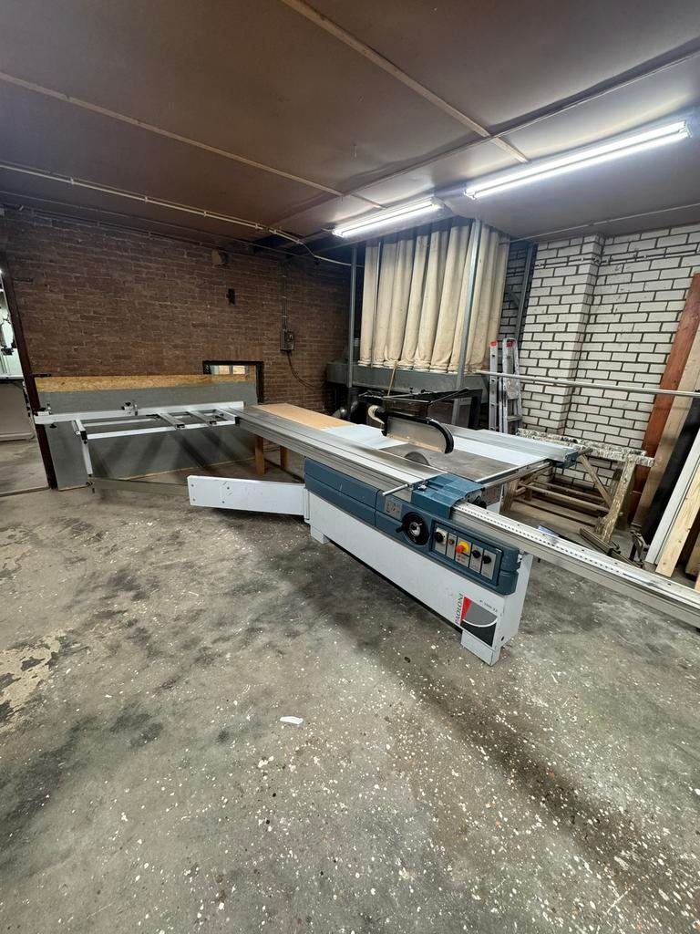 Formaatzaag machine, Ophalen