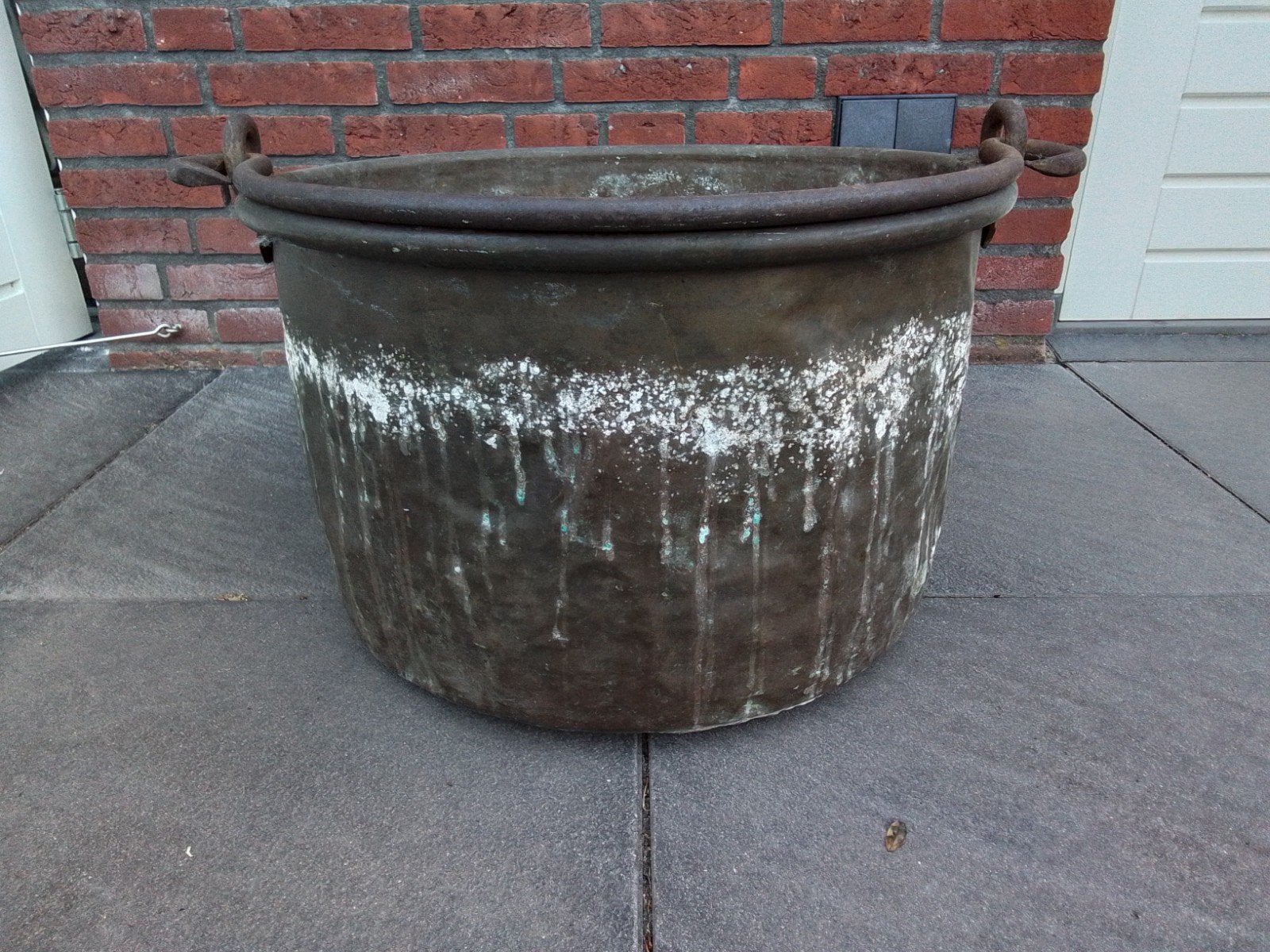 Grote  koperen ketel, Ophalen