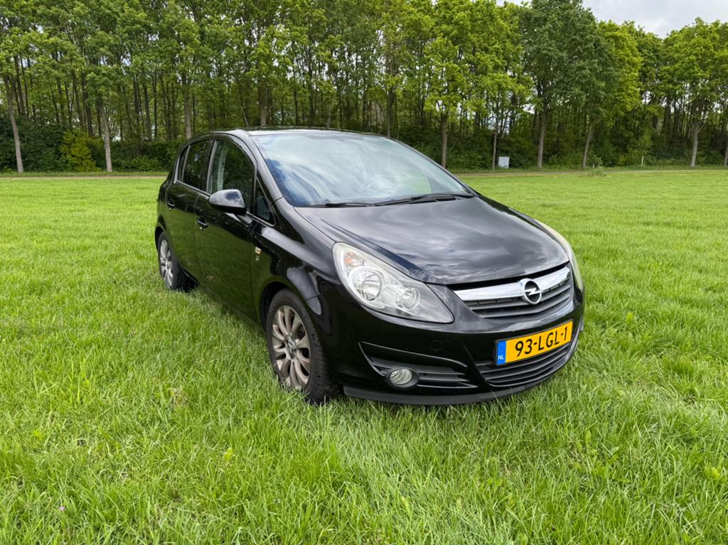 Opel Corsa 1.2 Twinport 85pk 5d 2010 Zwart, Auto's, Voorwielaandrijving, Stof, Zwart, 4 cilinders