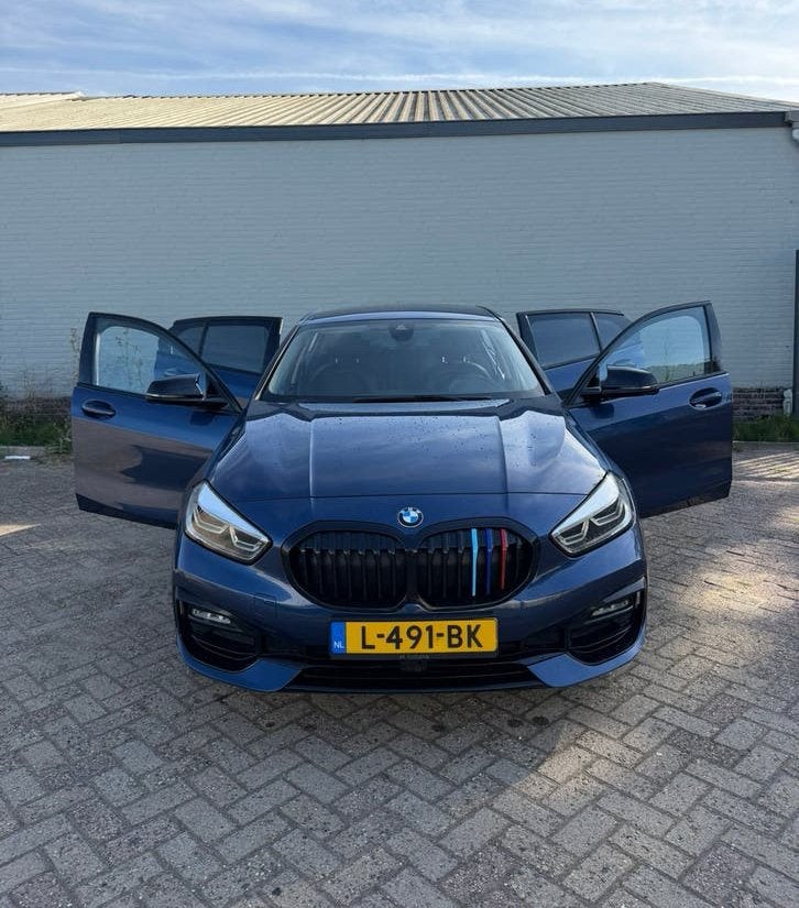 BMW 1-Serie 118i 136pk Aut 2021 Leer|Navi|Camera|M-stijl, Auto's, BMW, 136 pk, Blauw, Particulier, Multifunctioneel stuurwiel