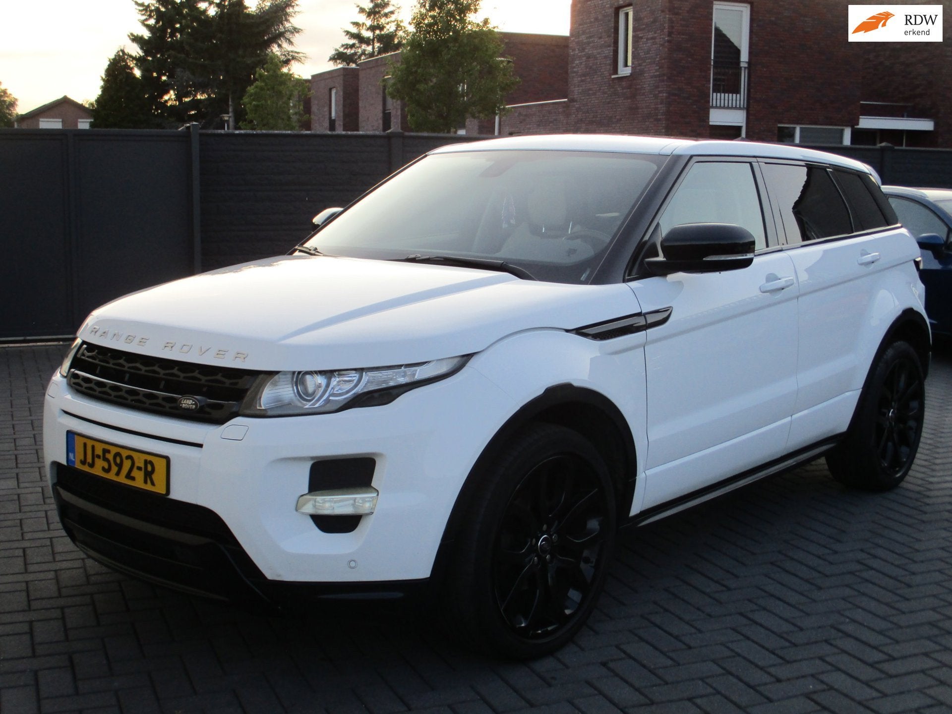 Land Rover Range Rover Evoque 2.0 Si 4WD Prestige AUT Panora, Auto's, Land Rover, Automaat, Euro 5, Zwart, 4 cilinders