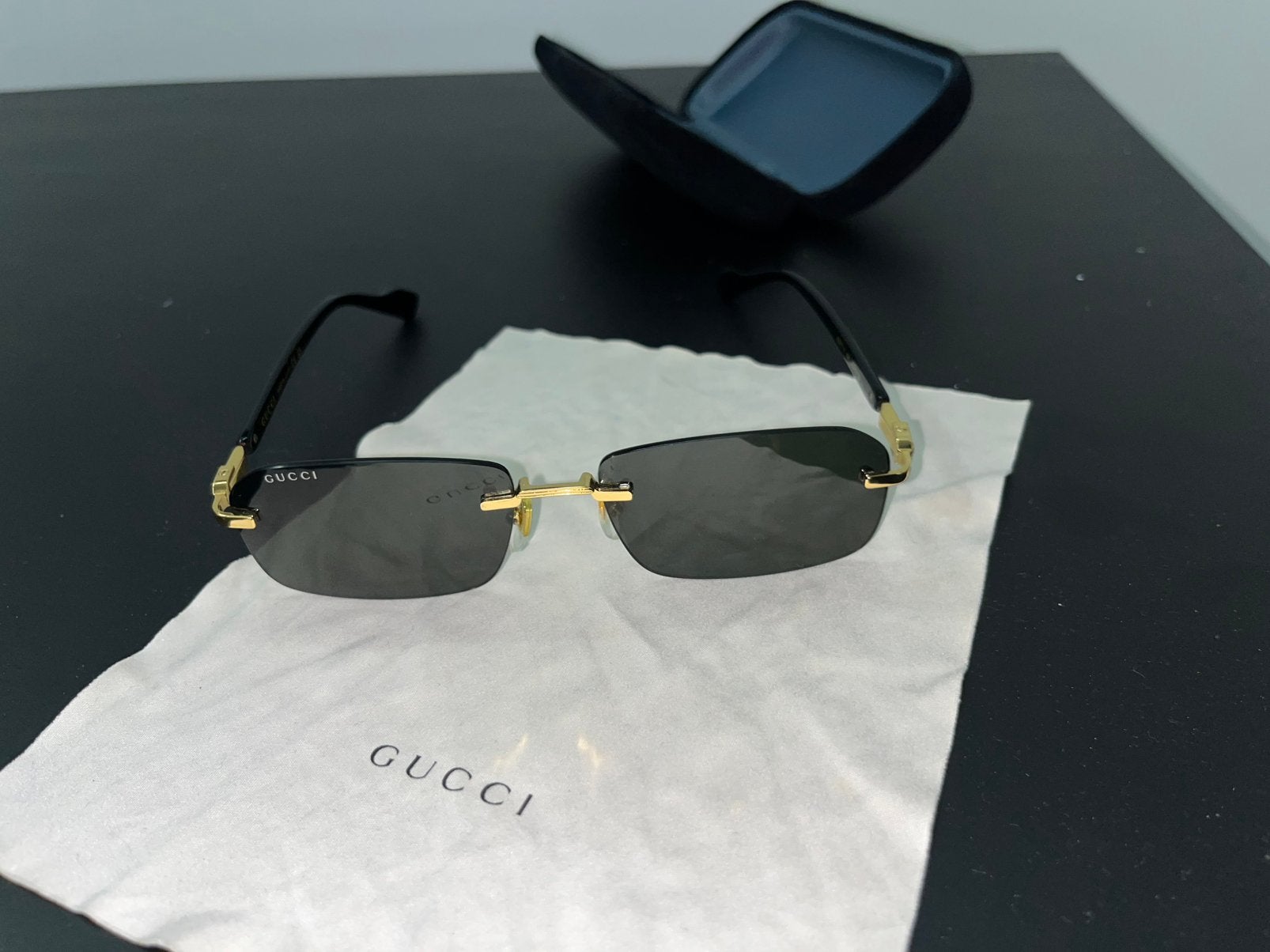 Gucci GG1221S-001 zonnebril rimless, Ophalen of Verzenden, Zo goed als nieuw, Zwart, Overige merken