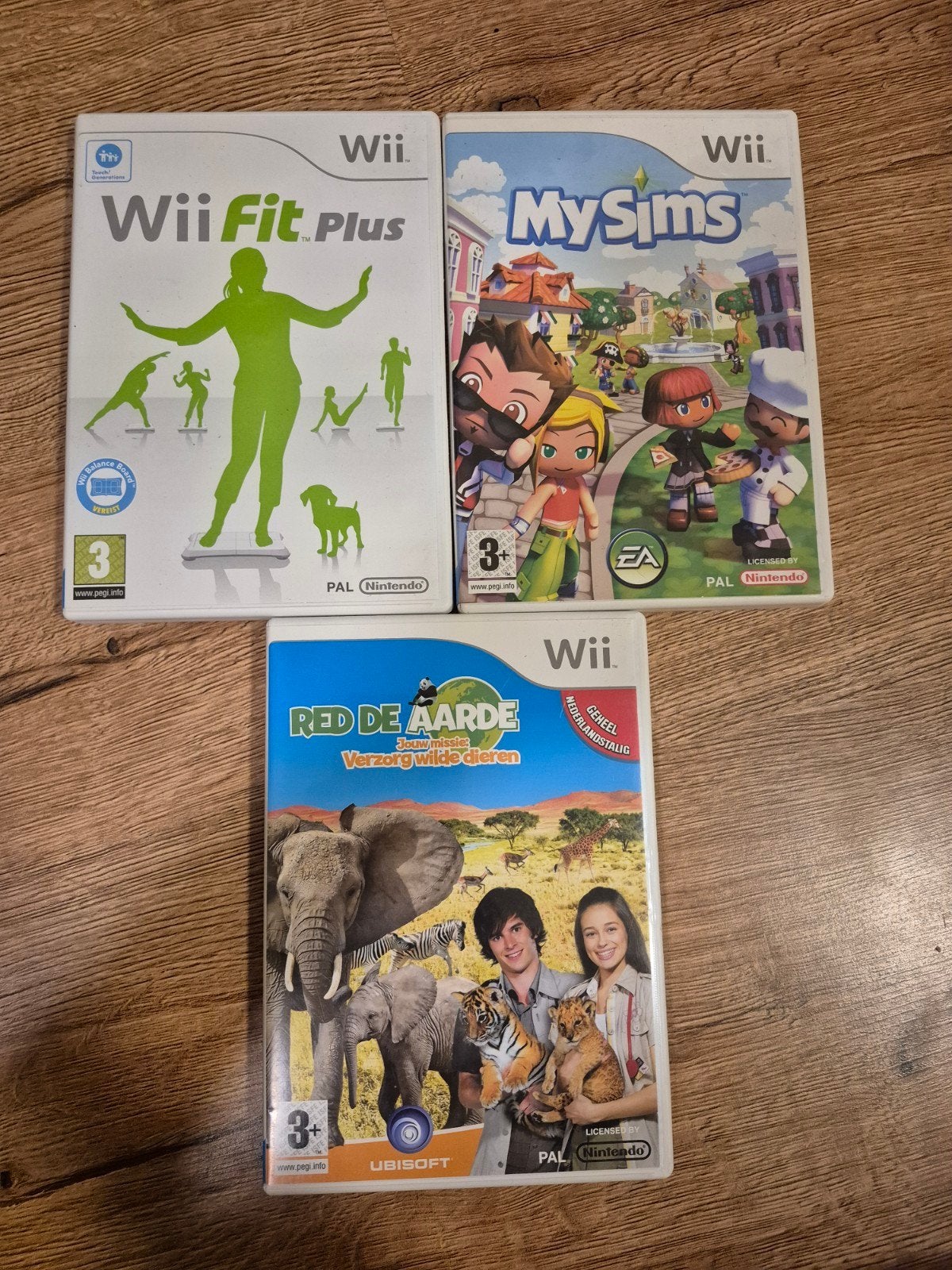 Wii Games: Wii Fit Plus, MySims, Red de Aarde, Spelcomputers en Games, Games | Nintendo Wii, Ophalen of Verzenden, Zo goed als nieuw