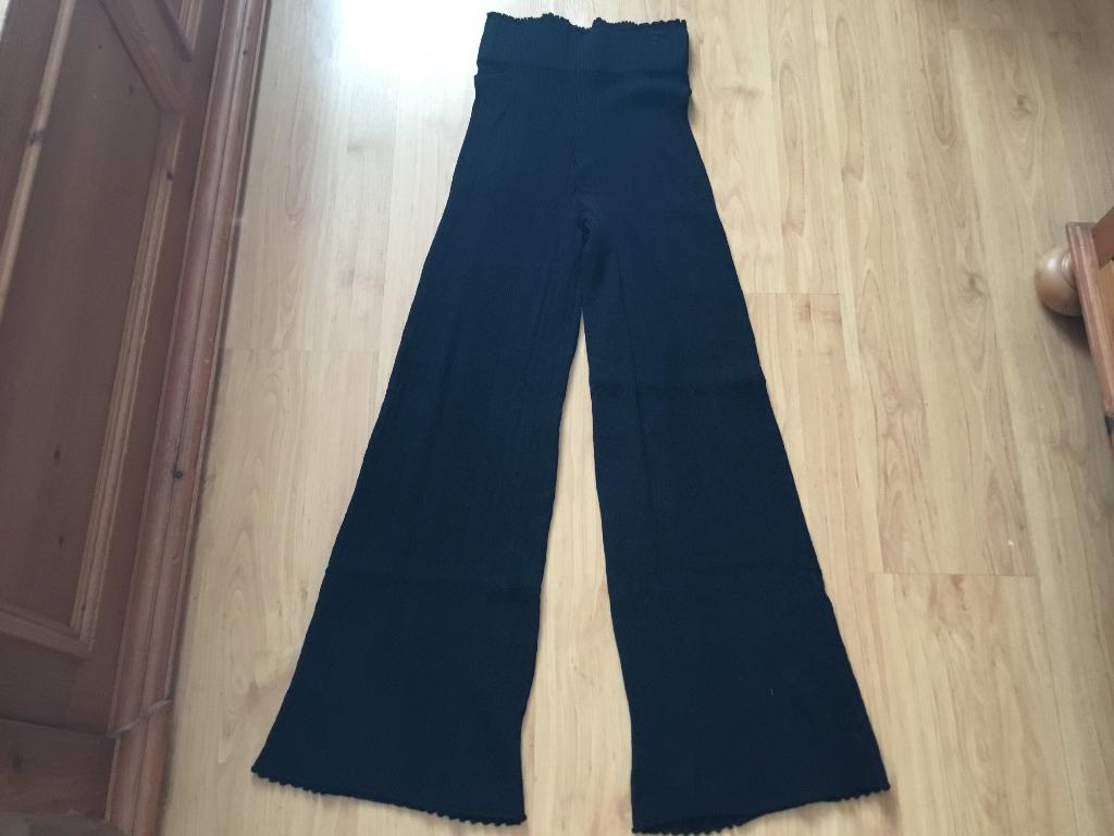 Zwarte broek met wijde pijpen.one size, Ophalen of Verzenden, Zo goed als nieuw, Zwart, Lang