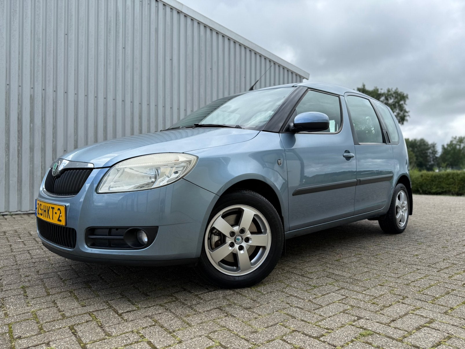 Skoda Roomster 1.6 16V 77KW 2009 Airco - Cruise - Trekhaak, Voorwielaandrijving, Zwart, 4 cilinders, Blauw