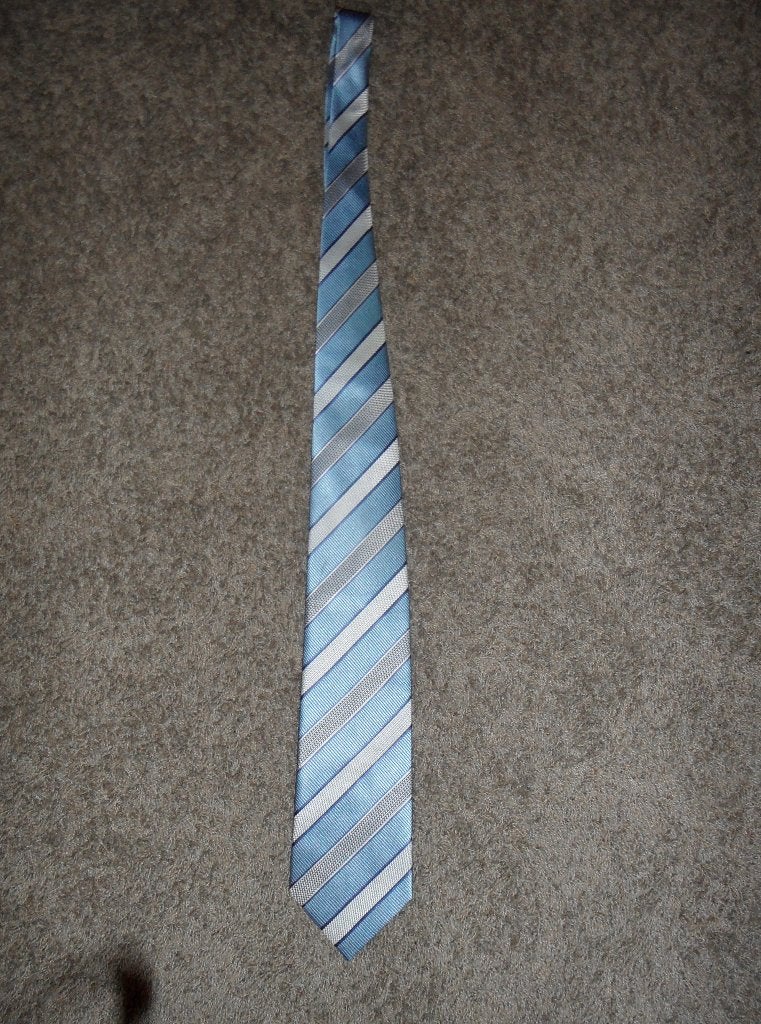 Prachtige lichtblauwe stropdas, 100% zijde, Kleding | Heren, Ophalen of Verzenden, Zo goed als nieuw, Blauw, Met patroon