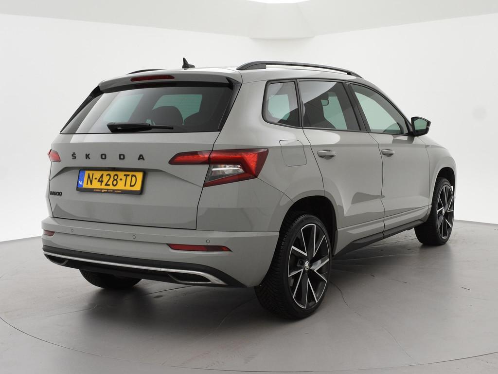 Skoda Karoq 1.5 TSI ACT 150 PK DSG SPORTLINE + CANTON AUDIO, Stof, 4 cilinders, 19 km/l, Adaptive Cruise Control