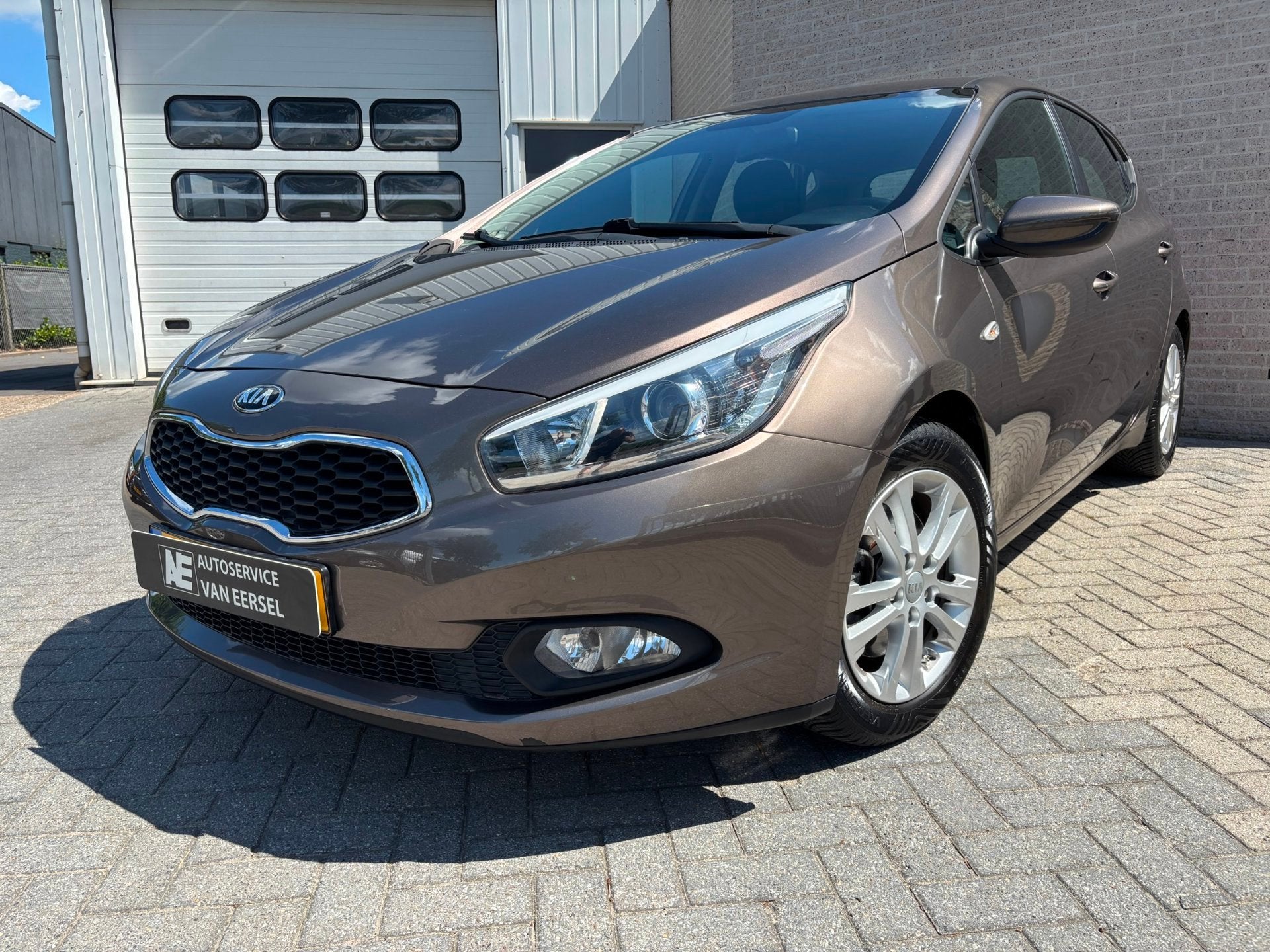 Kia Cee'd 1.4 CVVT AIRCO/4 SEIZOENEN BAND/PARROT., Auto's, Euro 5, Stof, Gebruikt, Zwart