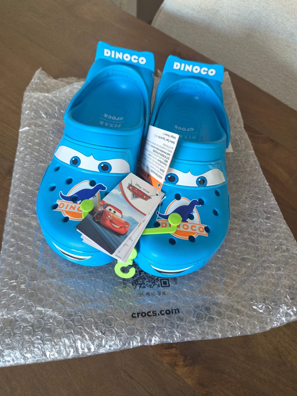 Dinoco Crocs 42/43, Slippers, Crocs, Blauw, Nieuw