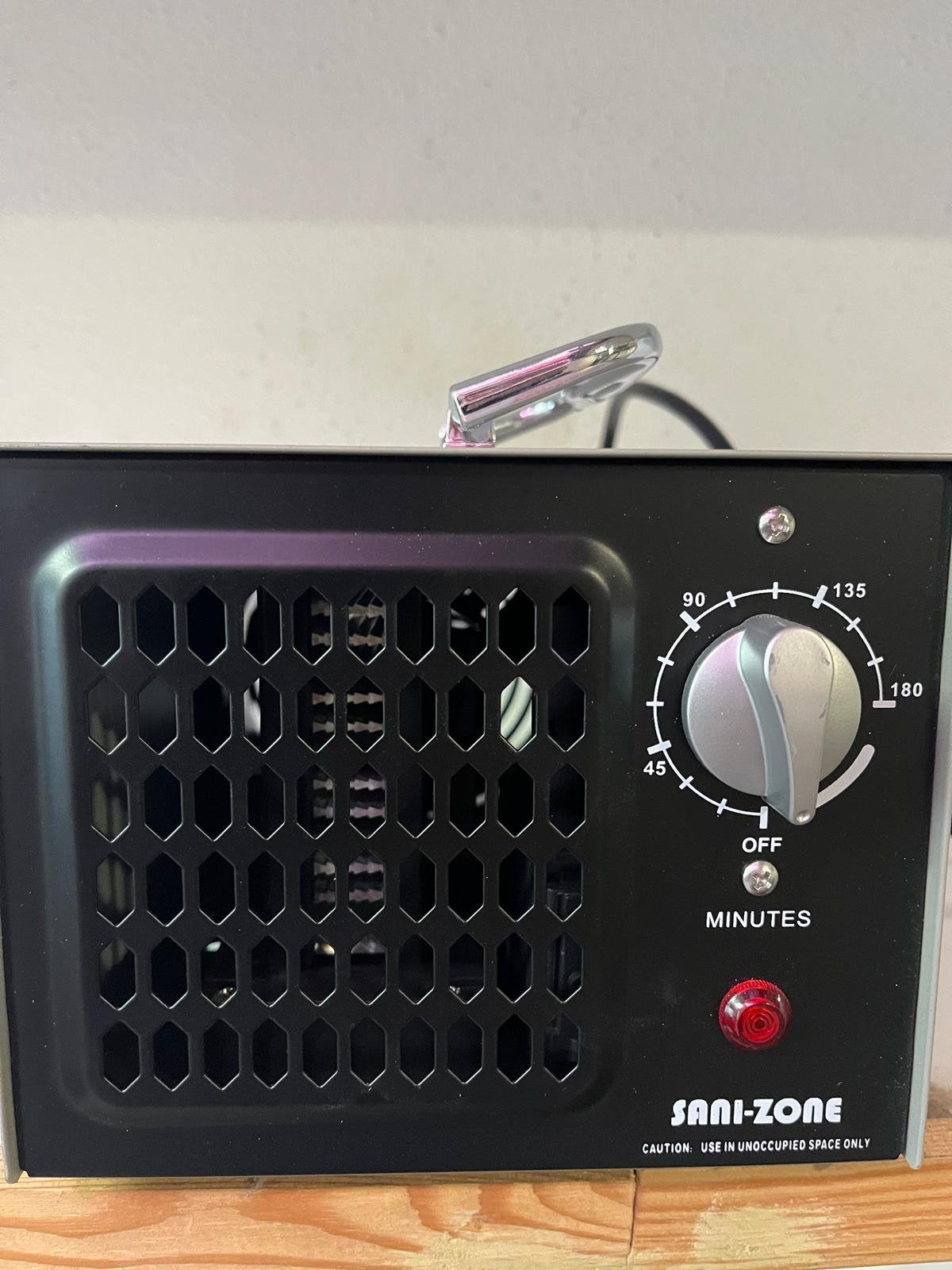 Sani Zone ozon generator, Ophalen